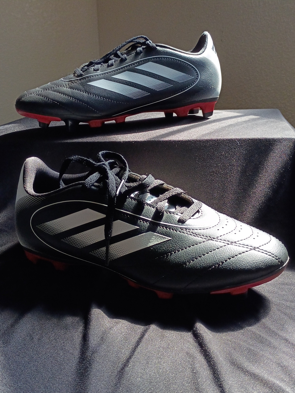 Adidas Men's Black Soccer Cleats with Red Accents